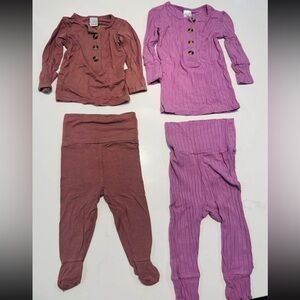 Two Lou Lou and Company baby girl two piece top and bottom sets.
